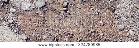 Destroyed Asphalt Cover On Road. Bad Road Condition That Needs Repair. Banner Size, Top View