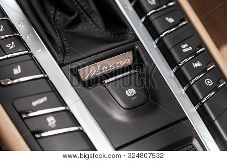Novosibirsk, Russia - September 07, 2019:  Porsche Macan,close-up Of The Accelerator Handle, Namepla