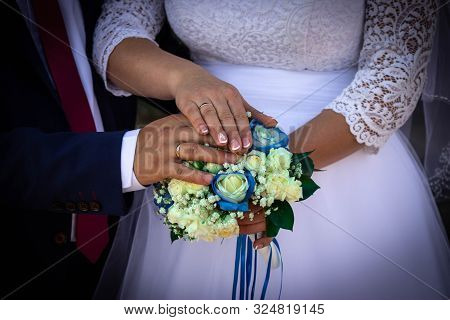 Hands, Rings And Bouquet.wedding Photo Of A Lifetime