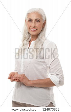 Portrait Of Beautiful Mature Woman On White Background