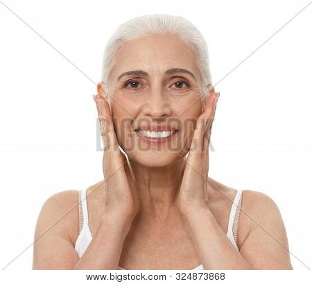 Portrait Of Beautiful Mature Woman On White Background