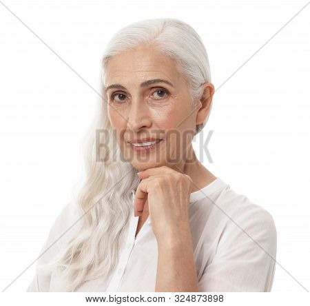 Portrait Of Beautiful Mature Woman On White Background