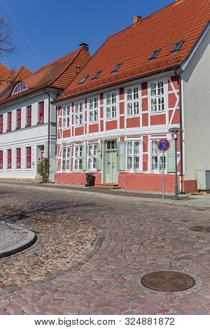 Boizenburg, Germany - April 16, 2019: Old Houses On A Cobblestoned Street In Boizenburg, Germany