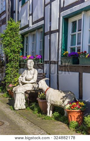 Herten, Germany - April 01, 2019: Statue Of A Mother And Child In The Old Village Of Westerholt, Ger