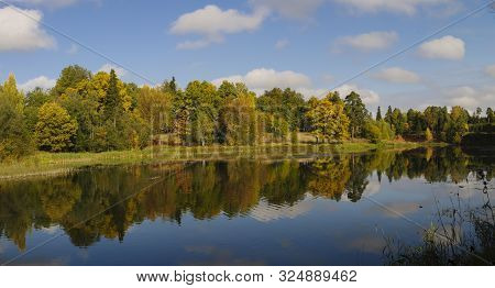 Beautiful Panorama Of Autumn River Bank On Clear Day