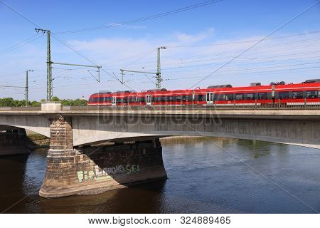 Dresden, Germany - May 10, 2018: Deutsche Bahn (german Railways) Train Crosses Marienbruecke (maria 