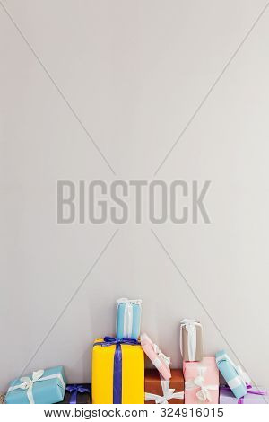 Multicolored Birthday Presents On A Grey Background