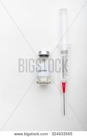 Medical Concept Showing Medical A Medical Vial Reading Oxycontin And A Syringe