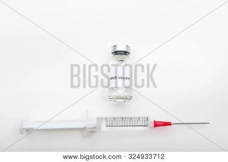 Medical Concept Showing Medical A Medical Vial Reading Mmr Vaccine With A Syringe