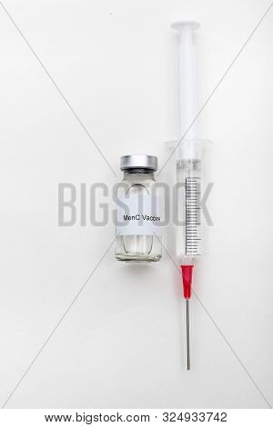 Medical Concept Showing Medical A Medical Vial Reading Menc Vaccine With A Syringe