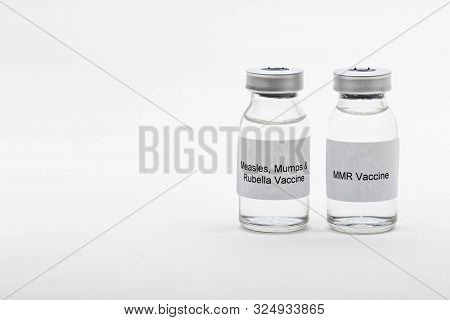 Medical Concept Showing Medical 2 Medical Vials Reading Mmr Vaccine And Measles, Mumps & Rubella Vac