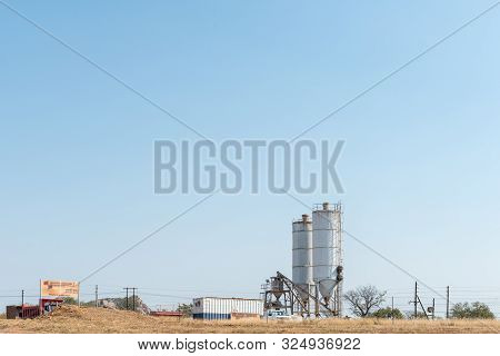 Phalaborwa, South Africa - May 18, 2019: A Concrete Ready Mix Business Near Phalaborwa. Equipment An