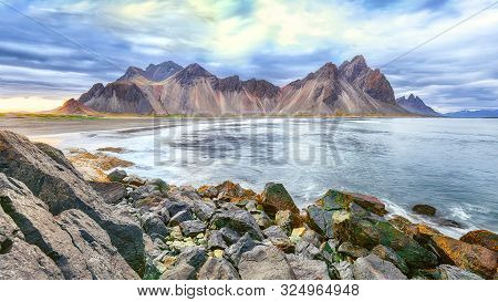 Dramatic Black Sand Beach On Stokksnes Cape In Iceland. Location: Stokksnes Cape, Vestrahorn (batman