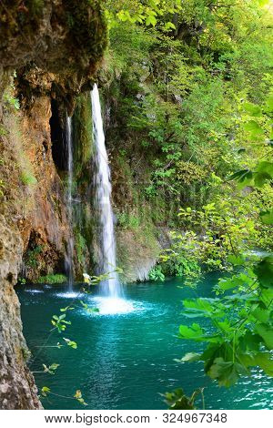 Waterfalls In Forest. Plitvice National Park, Croatia