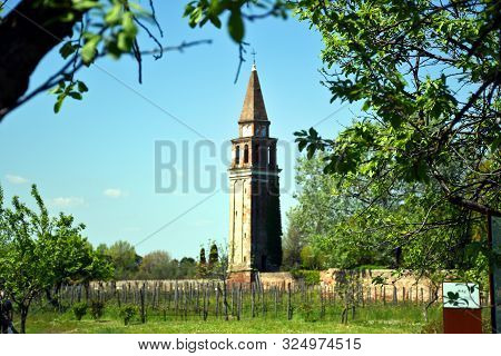 Mazzorbo, Italy, 07.20.2019: Church Of San Michele Arcangelo Of Mazzorbo Island In A Stunning, Beaut