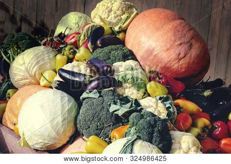 Closeup Of Freshly Vegetables. Automn Vegetables Mixed Up Together