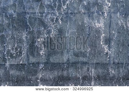 Running Water On Stone Background Texture. Abstraction Waterfall, Fountain Running Water