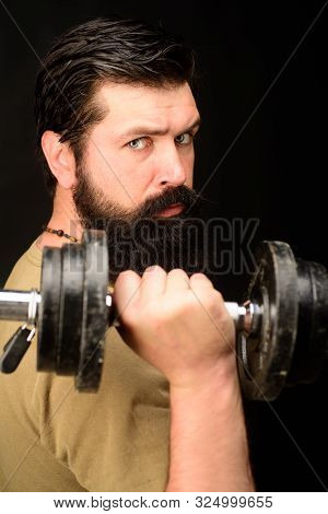 Handsome Man Lifting Dumbbell At Gym. Athletic Man Doing Exercise With Dumbbell. Sporty Man With Dum