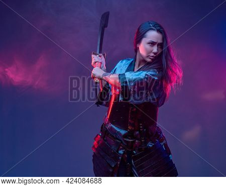 Woman Samurai In Fight Pose With Katana