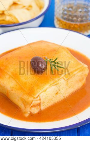 Tradirional Portuguese Dish Francesinha On Dish On Wooden Background