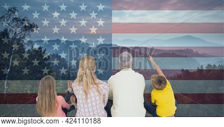 Composition of caucasian couple with son and daughter against american flag. united states of america patriotism and independence concept digitally generated image.