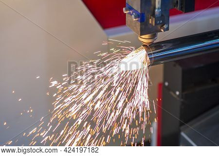 The Fiber Laser Cutting Machine Cutting The Stainless Steel Tube Control By Cnc Program. The Sheet M