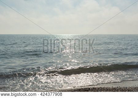 Silver Sea Glittering Background. Minimalistic Summer Landscape In Shades Of Gray And Silver. Midday