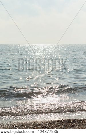 Silver Sea Glittering Background. Minimalistic Summer Landscape In Shades Of Gray And Silver. Midday
