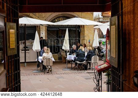 Strasbourg, France - May 19, 2021: People Eating Outside At Maison Kammerzell Iconic Restaurant As B