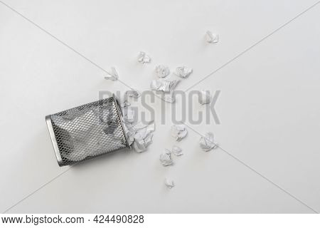 Bunch Of Crumpled Paper Balls In The Metal Rubish Bin Urn Basket On The Colorful Background