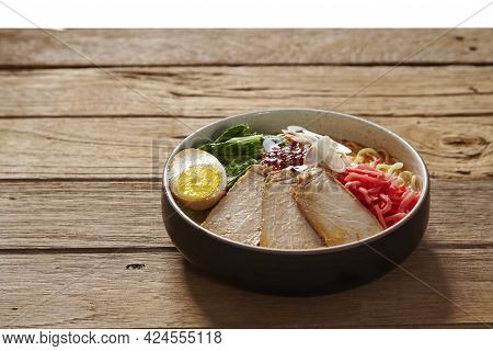 Delicious Tonkotsu Ramen, Japanese Noodle In Pork Bone Based Soup Topped With Sliced Chashu Pork, Bo