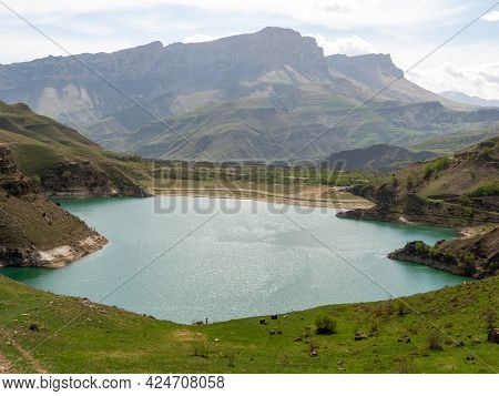 Lake Gizhgit Is A Large Reservoir Of Stunning Green Color, Located In A Mountainous Area. The Lake I
