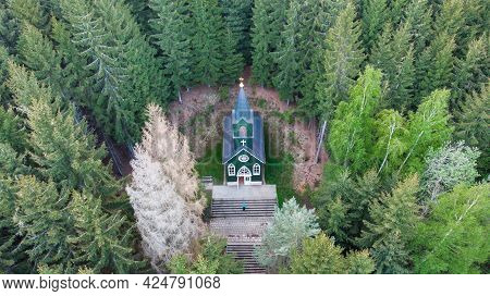 Aerial View Of Wooden Rural Chapel Called Tichackova Kaple In Broumovsko Region,czech Republic.catho