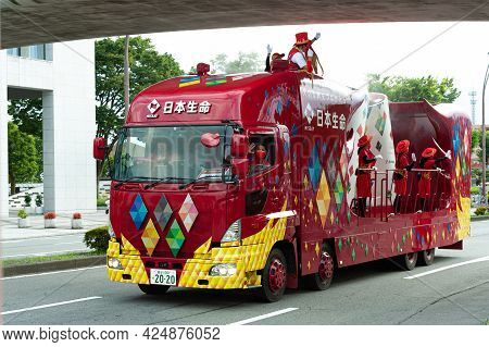 Fuji City, Shizuoka-ken, Japan - June 24, 2021: Tokyo 2020 Olympic Torch Relay. Car Parade With Part