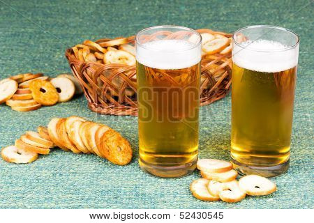 Small round mini bake rolls with a hole inside with beer