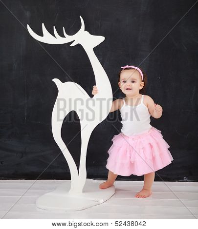Portrait Of The One Year Old Baby Wearing Ballet Suit