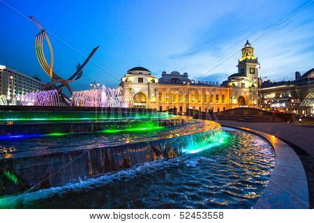 MOSCOW, RUSSIA - JUNE 14: View of Kievskiy railway station at night in June 14, 2012 in Moscow, Russia. Station was opened 1918 in the Byzantine Revival style pronounced in the 51 m high clocktower.