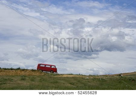 Old Red Van On A Cloudy Day