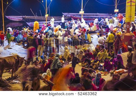 People In The Night In Varanasi In Religious Washing Ceremony