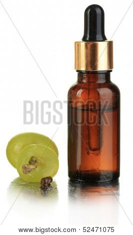 Ripe sliced grape and grapeseed oil, isolated on white