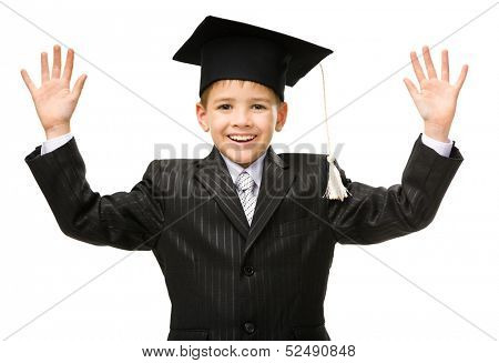 Half-length portrait of little student in academic cap happy gesturing, isolated on white. Concept of graduation and study