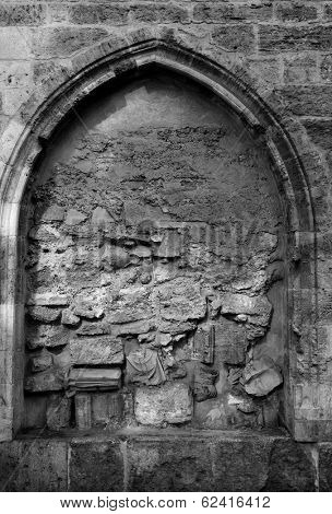 Valencia Santa Catalina church plaza Lope de Vega Arcosolio detail with broken sculpture in Spain