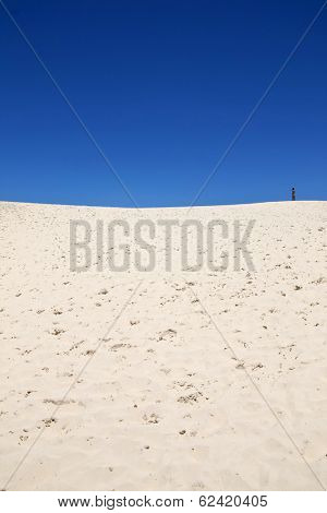 Clear sky at Joaquina dunes in Florianopolis - Santa Catarina - Brazil. The Joaquina dunes are very popular in Floprianopolis due its beautiful landscape and tourists enjoy to practice sand board.