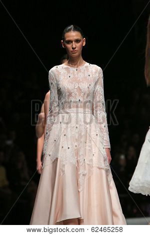 ZAGREB, CROATIA - MARCH 27: Fashion model wearing clothes designed by Mihano Momosa on the 'Fashion.hr' show on March 27, 2014 in Zagreb, Croatia