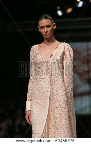 ZAGREB, CROATIA - MARCH 27: Fashion model wearing clothes designed by Mihano Momosa on the 'Fashion.hr' show on March 27, 2014 in Zagreb, Croatia