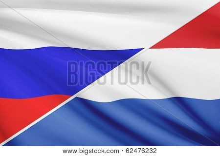 Series Of Ruffled Flags. Russia And Netherlands.