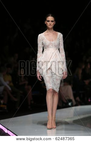 ZAGREB, CROATIA - MARCH 27: Fashion model wearing clothes designed by Mihano Momosa on the 'Fashion.hr' show on March 27, 2014 in Zagreb, Croatia