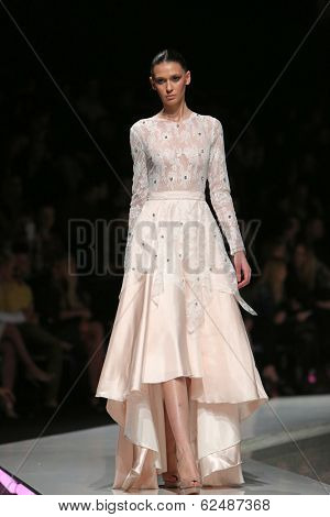 ZAGREB, CROATIA - MARCH 27: Fashion model wearing clothes designed by Mihano Momosa on the 'Fashion.hr' show on March 27, 2014 in Zagreb, Croatia