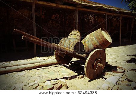 Antique Wagon With Barrels In The Castle Castelo De Castro Marim In Portugal.