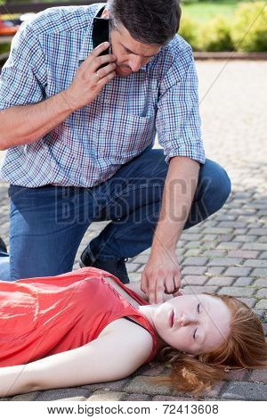 Man Sending For An Ambulance